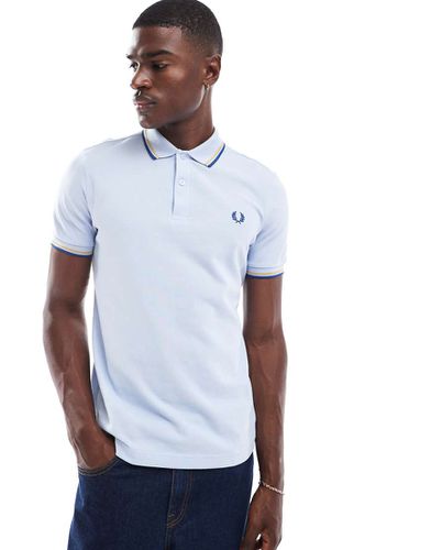 Polo azzurra con doppia riga a contrasto - Fred Perry - Modalova