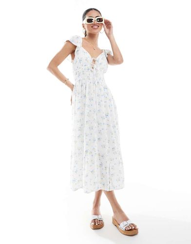 Robe mi-longue tendance folk à manches courtes avec imprimé fleuri et fente - Hollister - Modalova