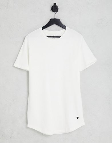 Essentials - T-shirt taglio lungo con fondo arrotondato bianca in coordinato - Jack & Jones - Modalova