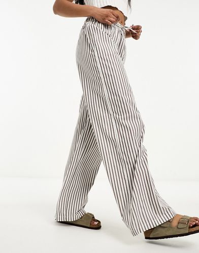 Pantaloni a fondo ampio con coulisse grigi e bianchi a righe - ONLY - Modalova