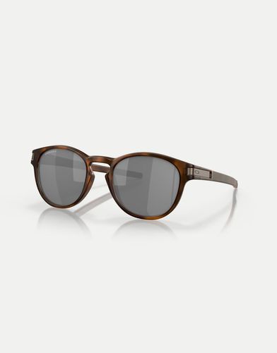 Latch™ - Occhiali da sole rotondi marroni tartarugati opachi con lenti grigie a specchio - Oakley - Modalova