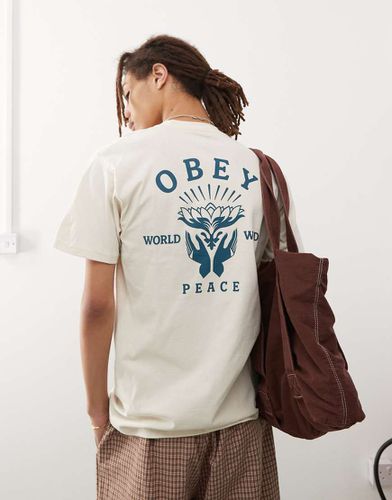 T-shirt beige con grafica con mani e fiore di loto - Obey - Modalova