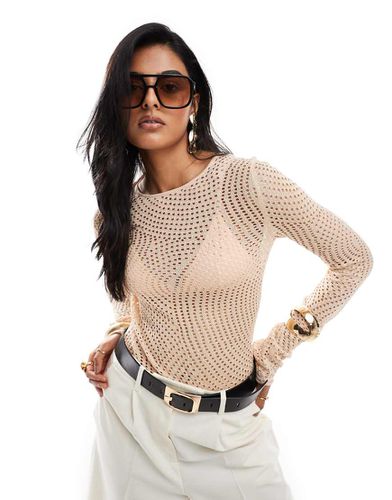 Top a maniche lunghe in maglia beige traforata con motivo ondulato - Other Stories - Modalova