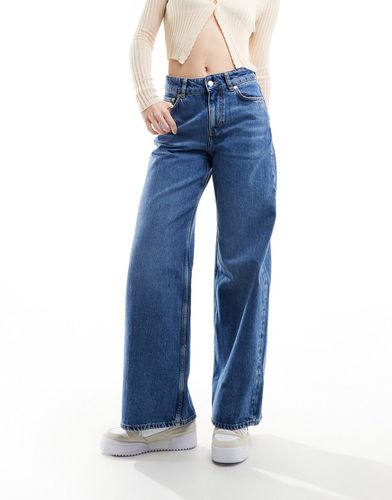 Gio - Jeans a vita medio alta a fondo ampio lavaggio medio - Other Stories - Modalova