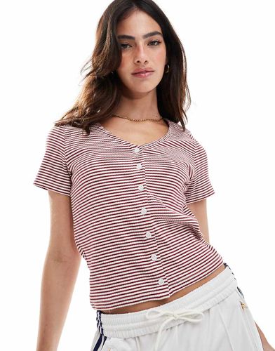 Muse - T-shirt rossa a righe con scollo a V e bottoni - Levi's - Modalova