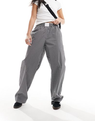 Pantaloni a fondo ampio con vita stile boxer neri a righe - Lioness - Modalova
