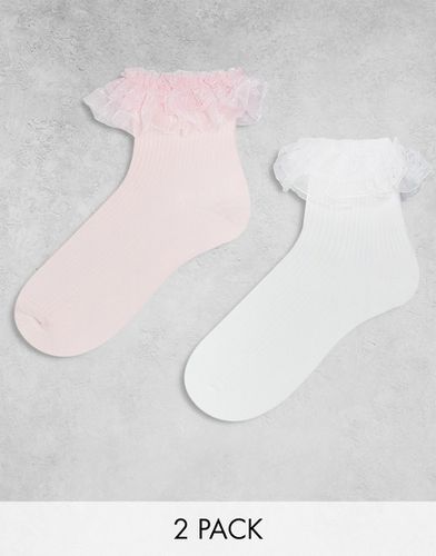 Confezione da 2 paia di calzini con volant rosa e bianchi - Monki - Modalova