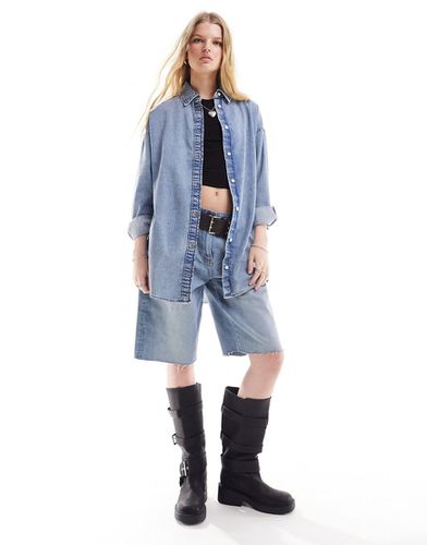 Camicia in denim oversize lavaggio screziato - Monki - Modalova