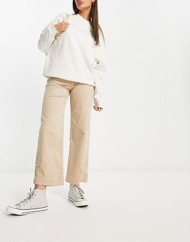 Pantaloni dritti beige in tessuto a coste con risvolto - Monki - Modalova