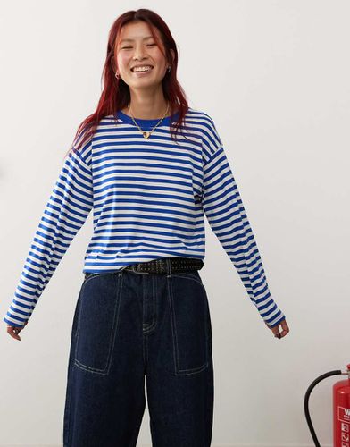 Top a maniche lunghe a righe color blu e bianco - Monki - Modalova