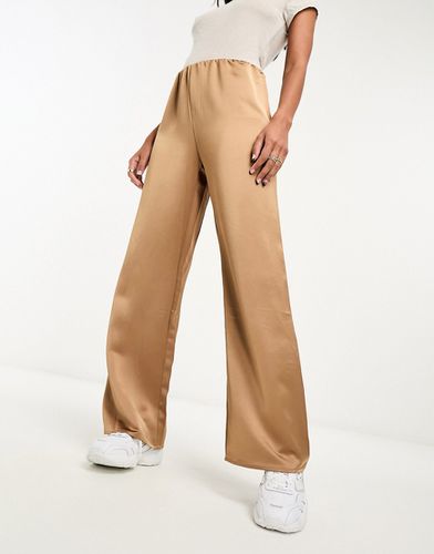 Pantaloni a fondo ampio con vita elasticizzata marroni - Mango - Modalova
