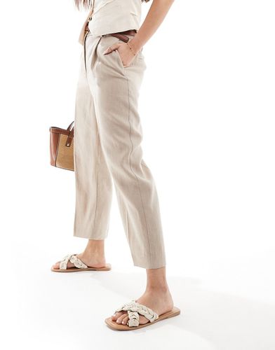 Pantaloni slim con elastico in vita in lino beige - Mango - Modalova