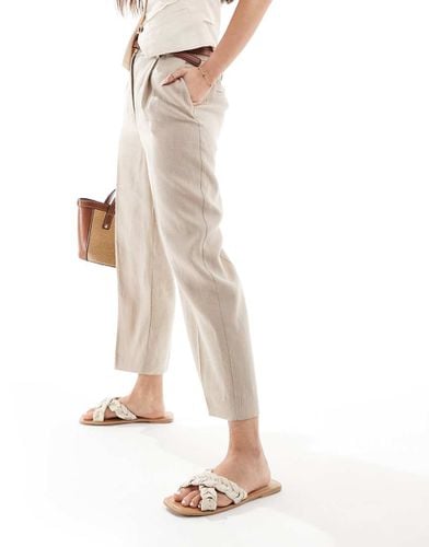 Pantaloni slim con elastico in vita in lino beige - Mango - Modalova