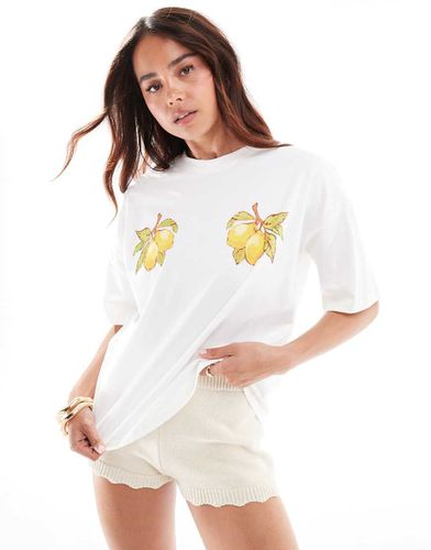 T-shirt bianca con stampa di limoni - Never Fully Dressed - Modalova