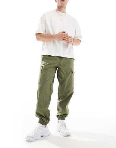 Joggers cargo in twill verdi - New Balance - Modalova