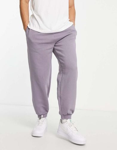 Joggers oversize lilla polvere - New Look - Modalova