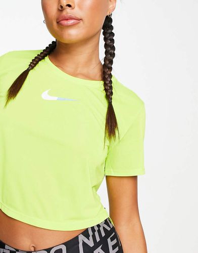 One Dri-FIT - Top corto senza maniche lime - Nike Training - Modalova