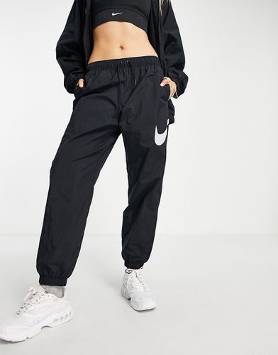 Joggers oversize con logo neri - Nike - Modalova
