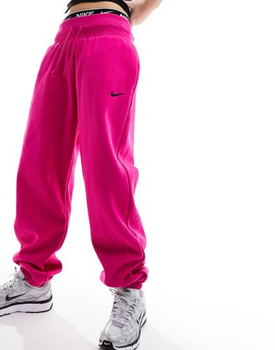 Joggers oversize in pile con logo piccolo - Nike - Modalova