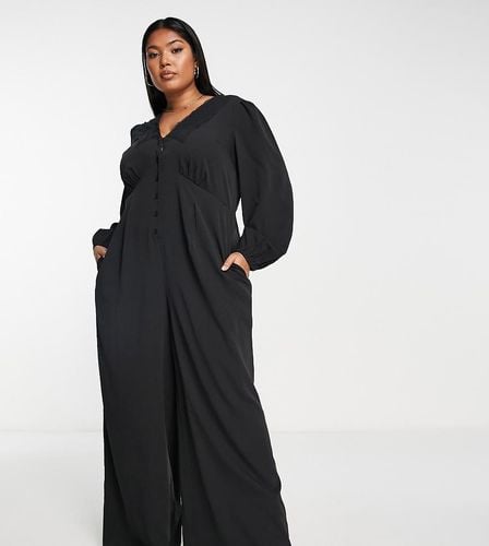 Tuta jumpsuit nera a fondo ampio con bottoni - Simply Be - Modalova