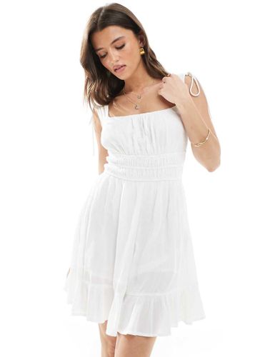 Robe fluide à volants - Stradivarius - Modalova