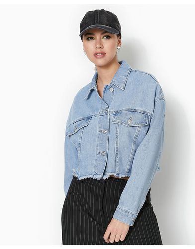 Giacca di jeans corta oversize con bordo grezzo e lavaggio chiaro - Pimkie - Modalova