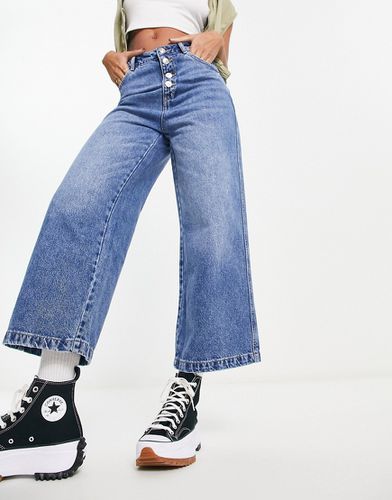 Jeans a fondo ampio e vita alta con bottoni con pietre - Pimkie - Modalova