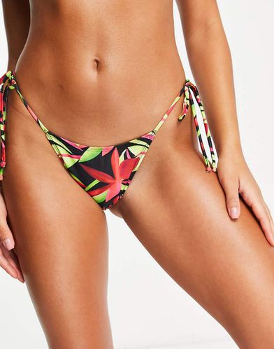 Slip bikini sgambato con stampa a fiori con palme - Public Desire - Modalova