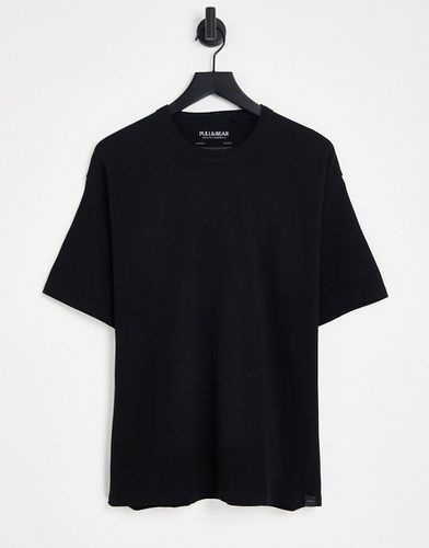 T-shirt oversize nera - Pull & Bear - Modalova