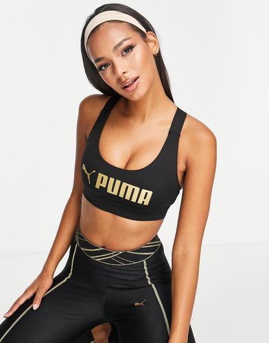 Reggiseno sportivo a sostegno medio - Puma - Modalova