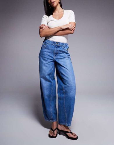 Jean bouffant élastique - moyen délavé - River Island - Modalova