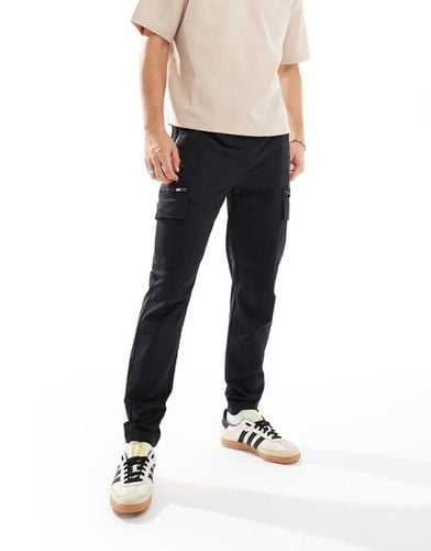 Pantaloni cargo skinny neri - River Island - Modalova