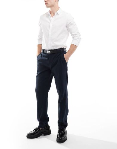 Pantaloni sartoriali navy slim fit - River Island - Modalova