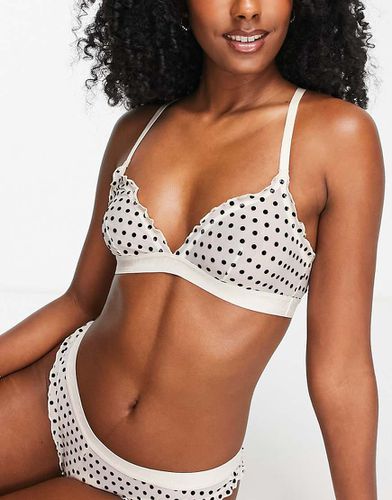 Reggiseno in tessuto a rete plumetis crema - River Island - Modalova