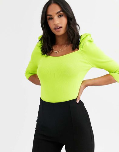 Top in maglia con maniche a sbuffo lime - River Island - Modalova