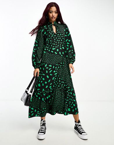 Vestito grembiule verde e con gonna al polpaccio e stampa stilizzata - Wednesday's Girl - Modalova