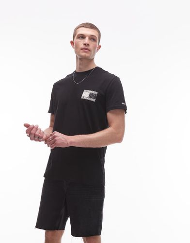 T-shirt avec logo drapeau à motif cachemire - Tommy Jeans - Modalova