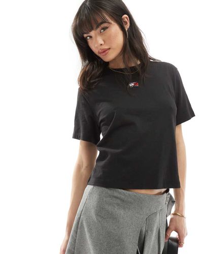 T-shirt squadrata nera con stemma - Tommy Jeans - Modalova