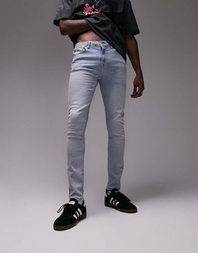 Jeans spray on lavaggio chiaro - Topman - Modalova