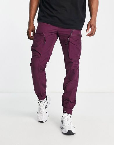 Pantaloni cargo cut and sew skinny con cintura - Topman - Modalova