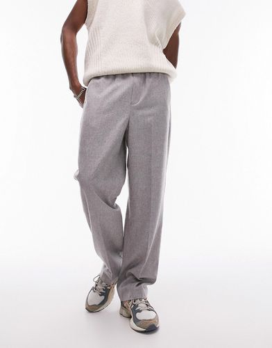 Pantaloni con fondo ampio in misto lana con fascia in vita elasticizzata - Topman - Modalova