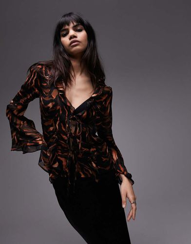 Top trasparente stropicciato con allacciatura sul davanti e stampa animalier colore - Topshop - Modalova