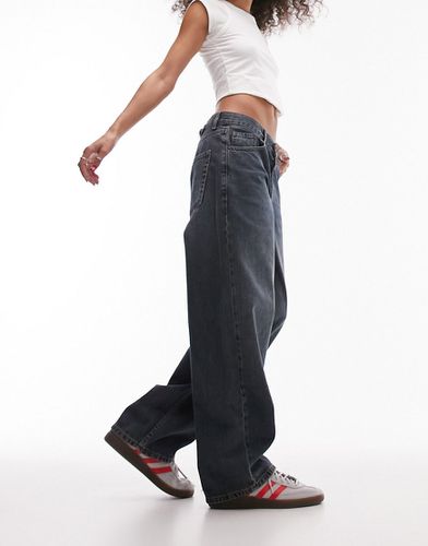 Jeans con cinturino sul retro effetto sporco - Topshop - Modalova