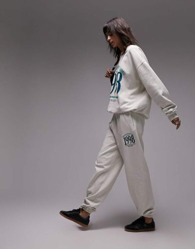 Joggers oversize écru lavaggio vintage con grafica "Prince Street NYC" in rilievo in coordinato - Topshop - Modalova