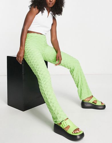 Pantaloni a zampa in dévoré verde a scacchi in coordinato - Topshop - Modalova