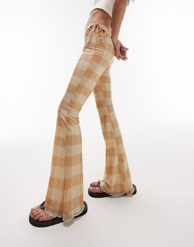 Pantaloni a zampa in rete beige a quadri con laccetti laterali - Topshop - Modalova