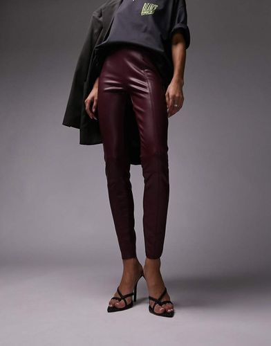 Pantaloni skinny in pelle sintetica bordeaux - Topshop - Modalova