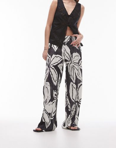 Pantaloni plissé stropicciati monocromatici con grafica a fiori - Topshop - Modalova