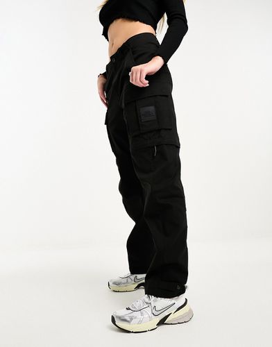NSE Convin - Pantaloni ampi neri stile cargo con zip - The North Face - Modalova