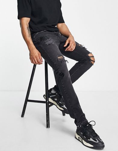 Jeans comodi invecchiati neri con toppe di picche ricamate - The Couture Club - Modalova